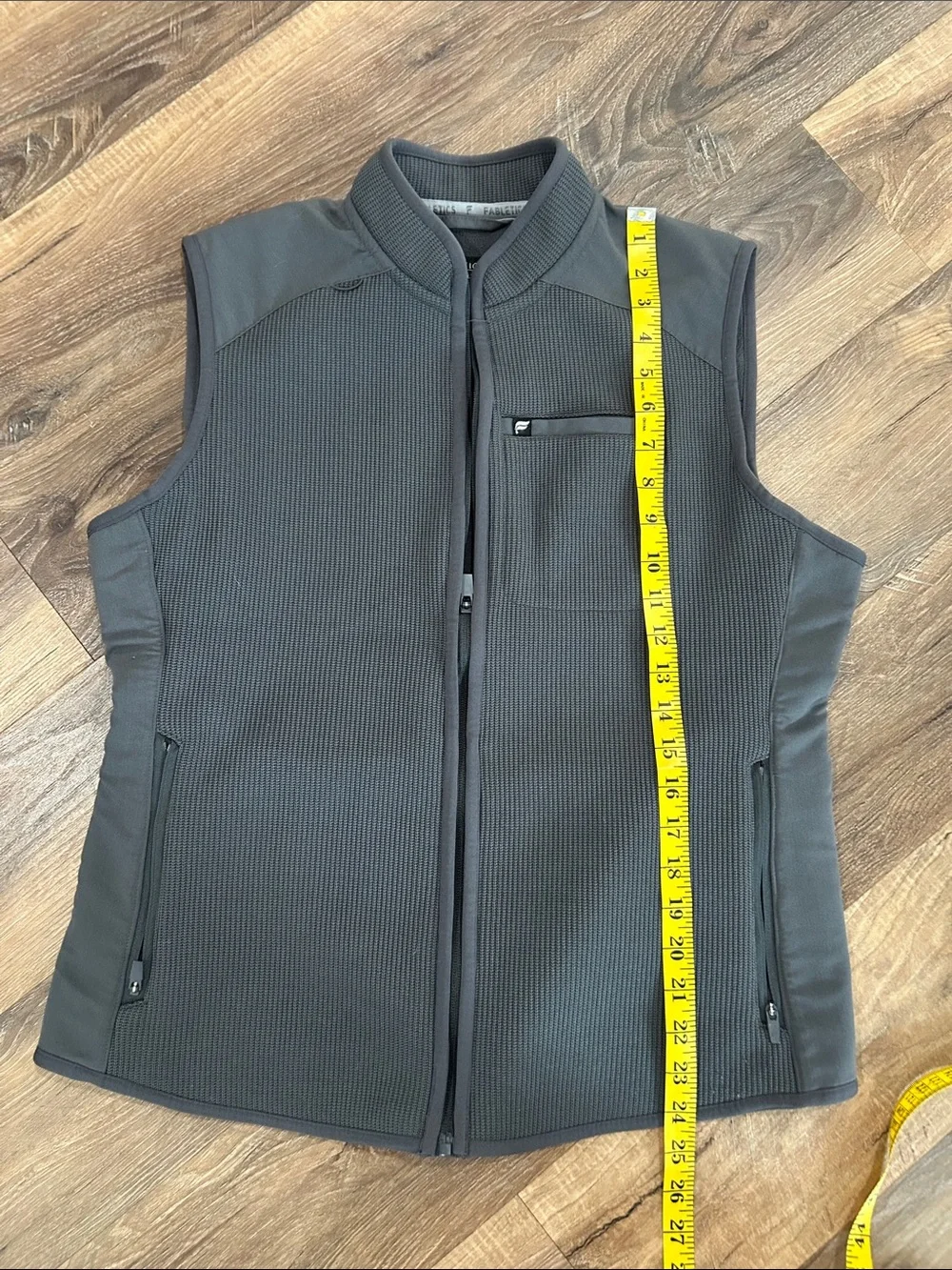 Fabletics men’s gray vest feel good performance, large zip pockets